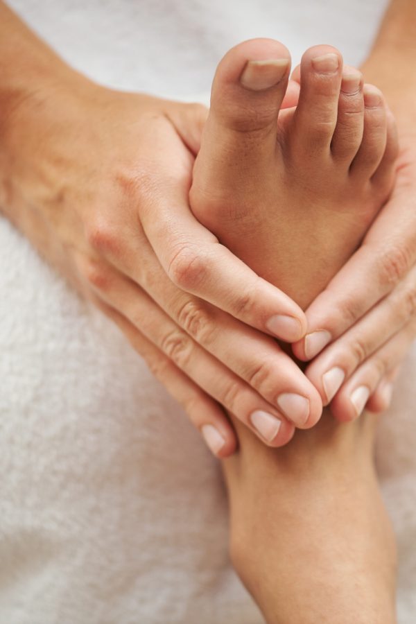 The perfect pedicure. Cropped shot of a womans foot being massaged